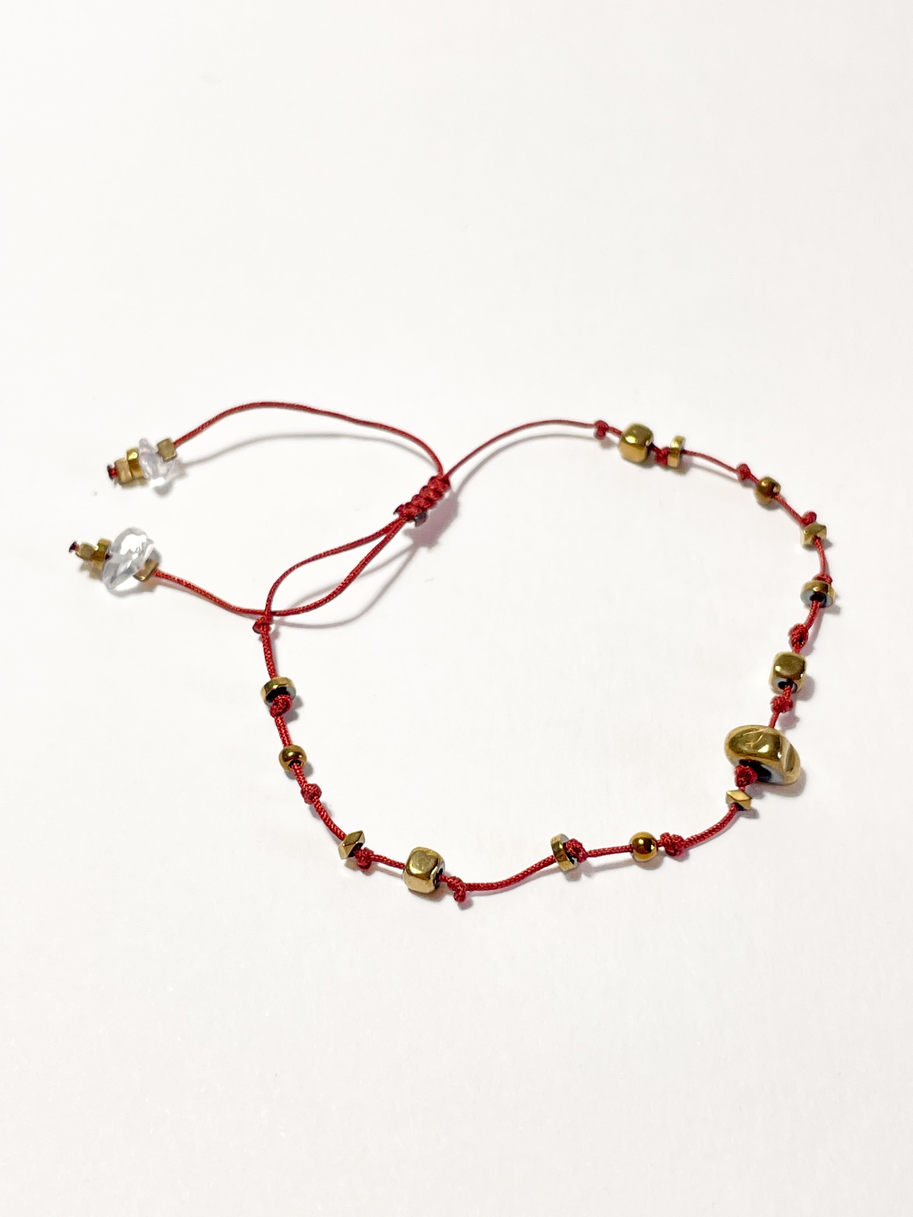 bracelet fin unisexe en hematite dorée, noeud coulissant bordeaux 