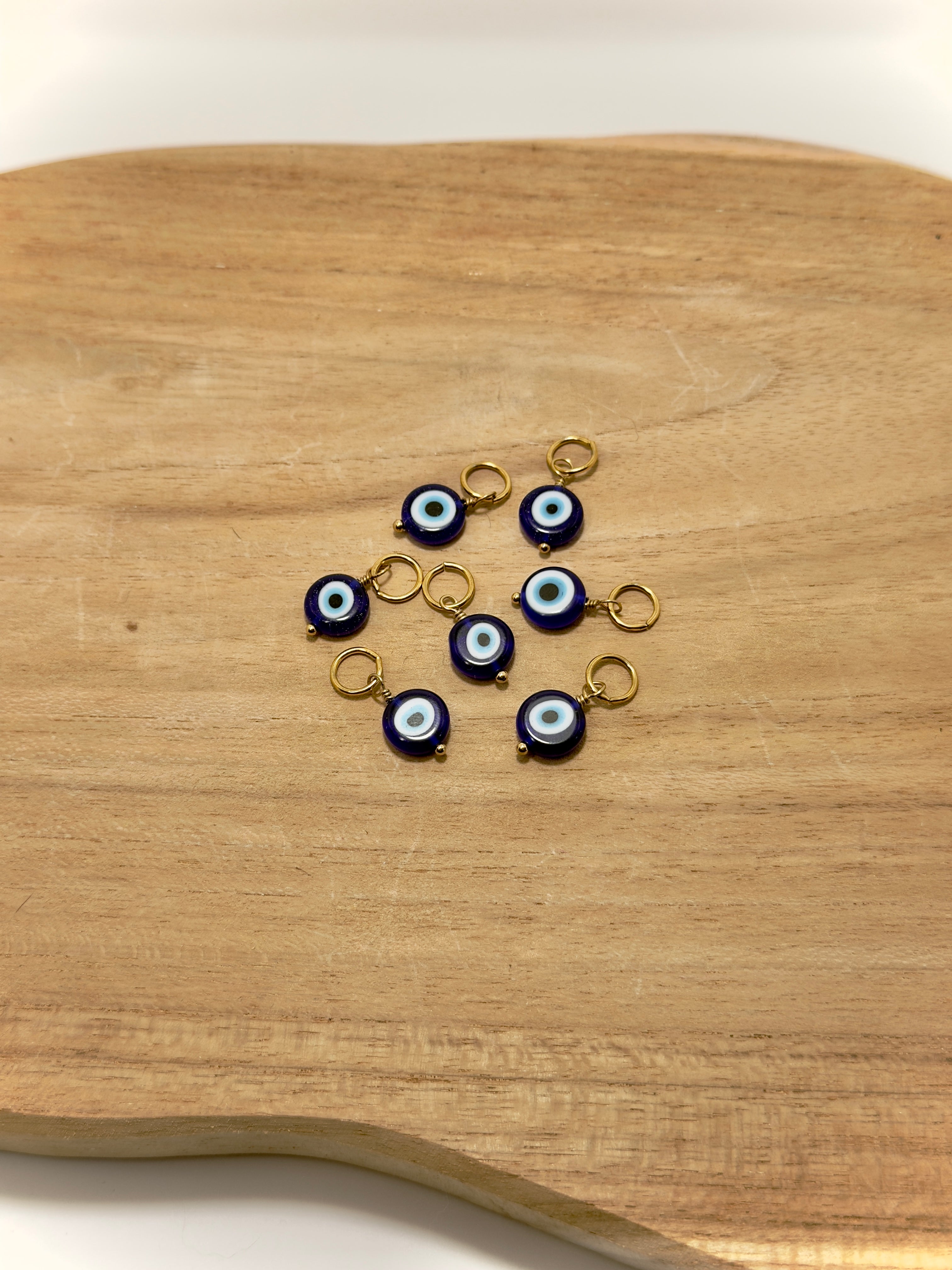 Brelouqe oeil grec bleu en verre et acier inoxydable 