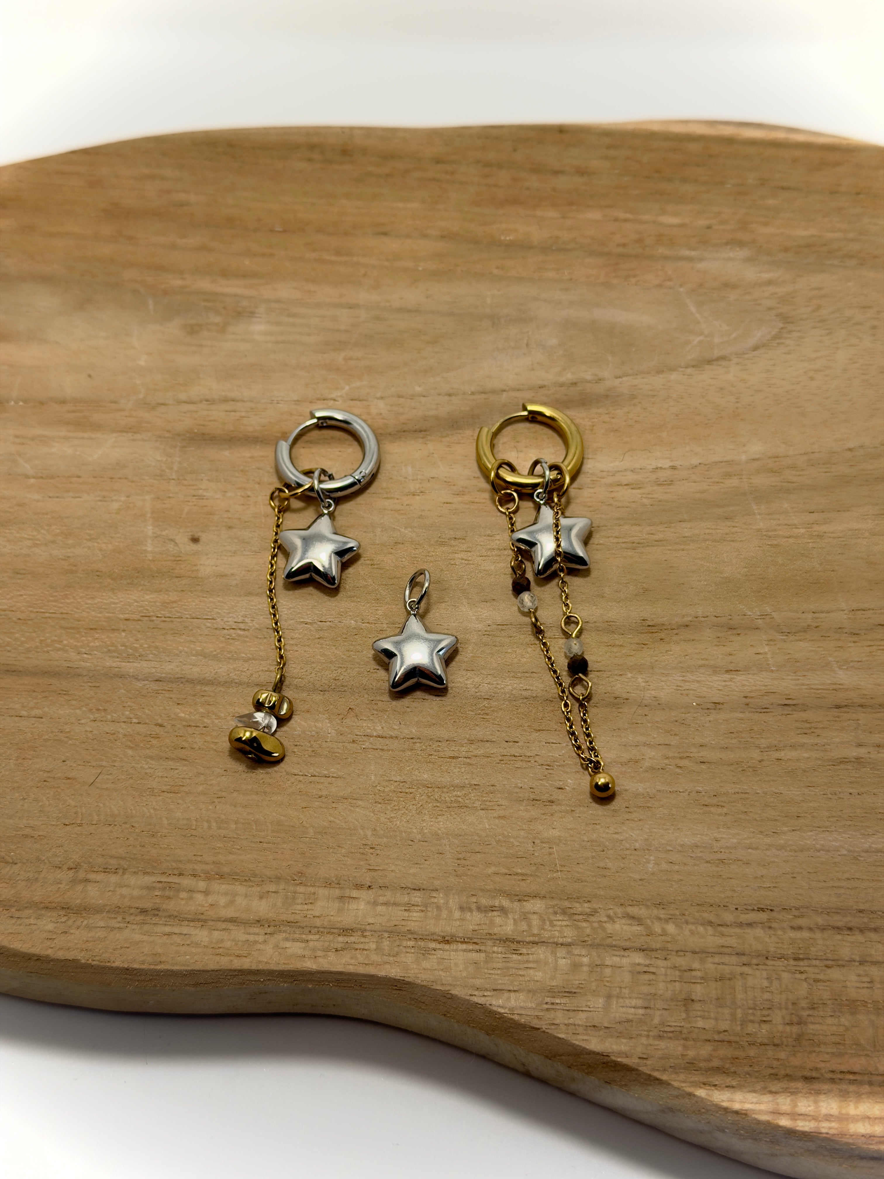 Boucles d'oreilles avec breloque étoile bombée en acier inoxydable 