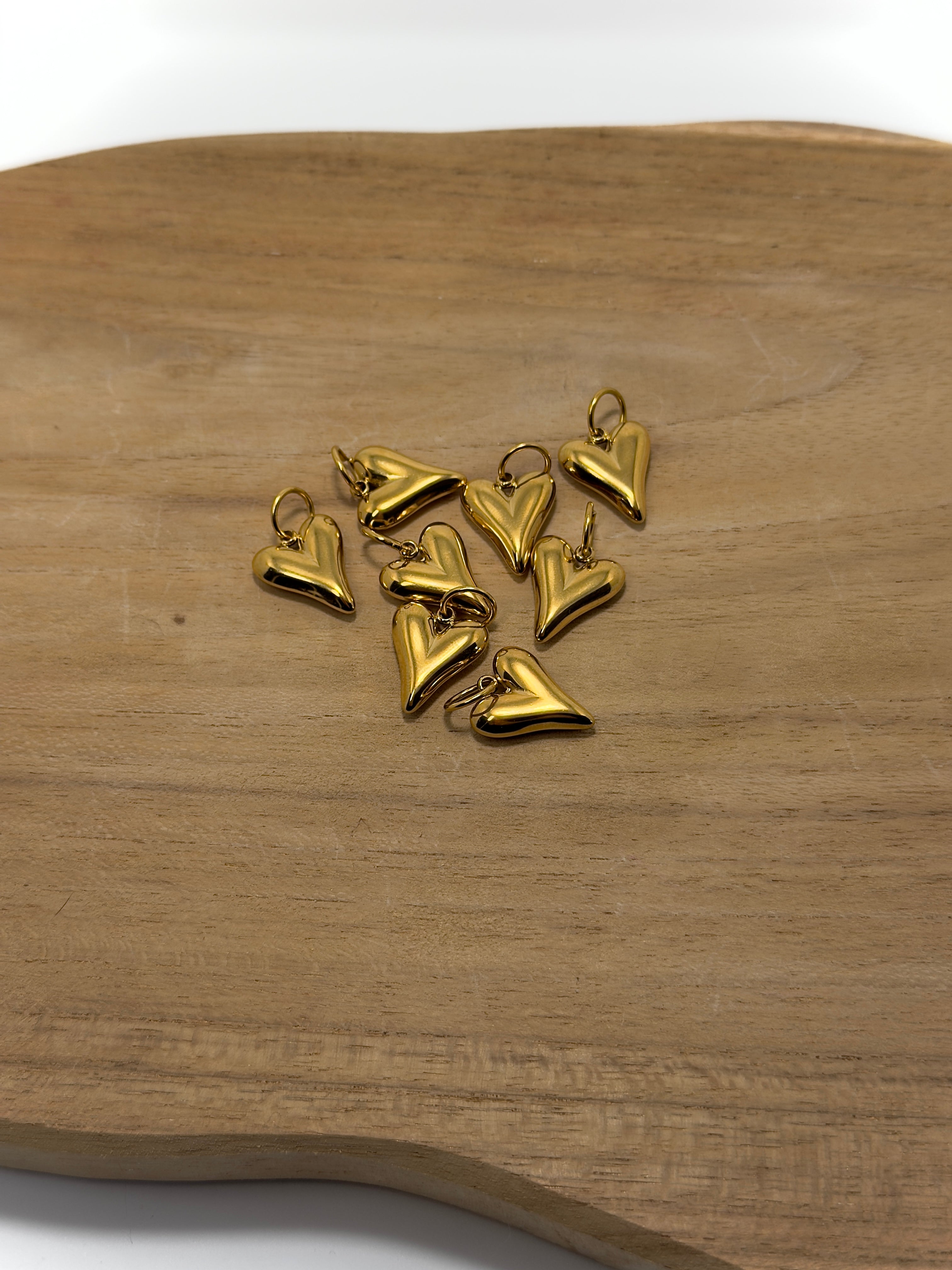 breloque coeur bombé en acier inoxydable